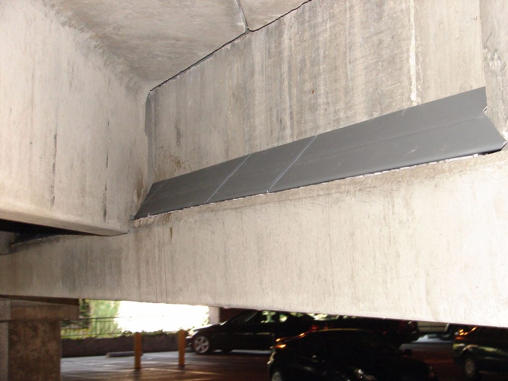 BirdSlide End Cap on a concrete structure