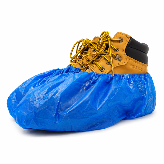 Blue shoe cover over a brown boot with yellow laces on a white background