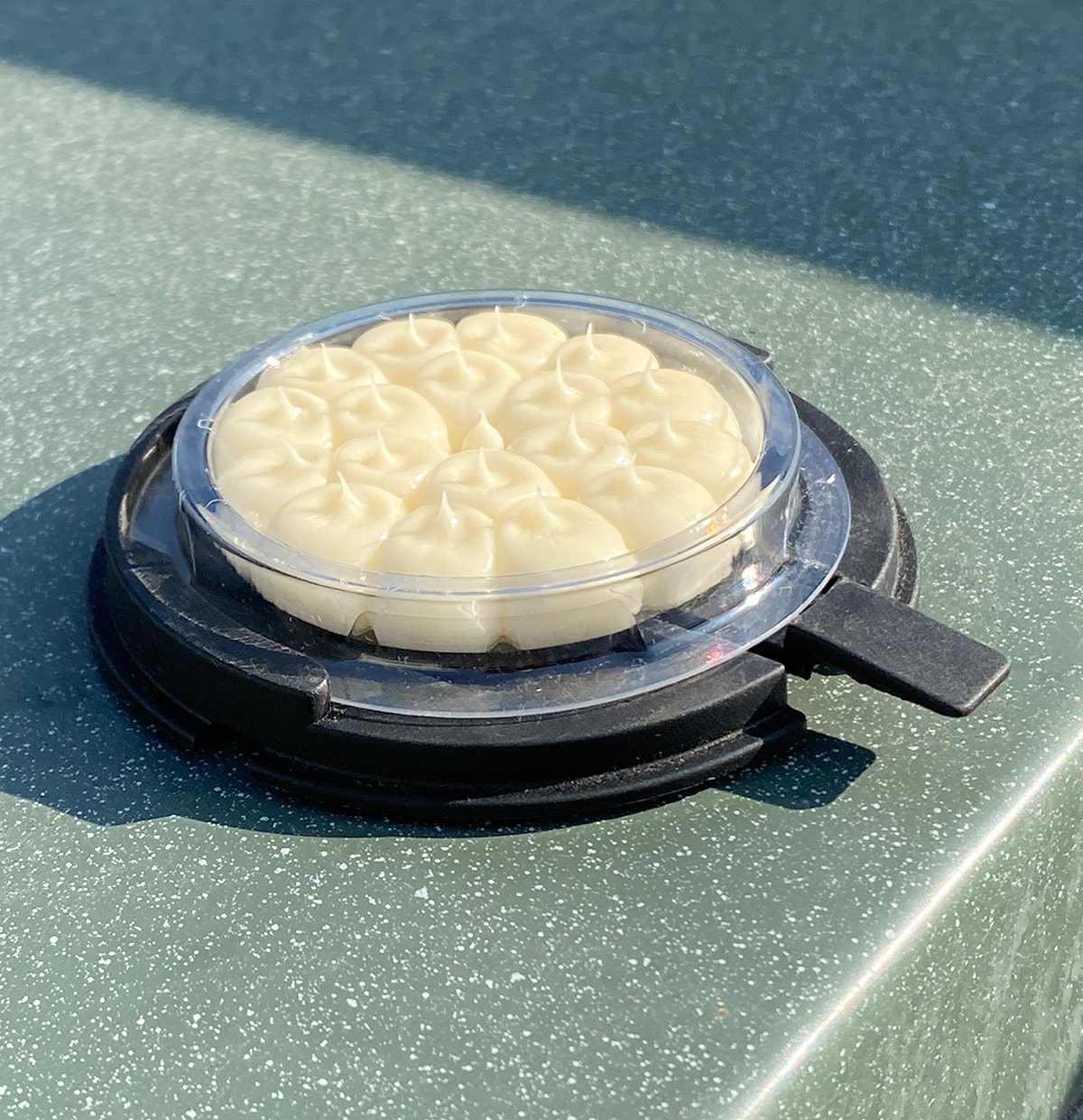 Optical Gel™ with black base on a reflective surface